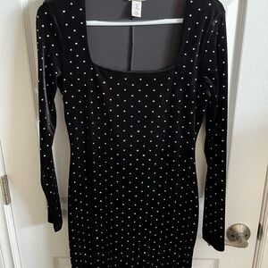 Elegant Black Dress with Silver Accents